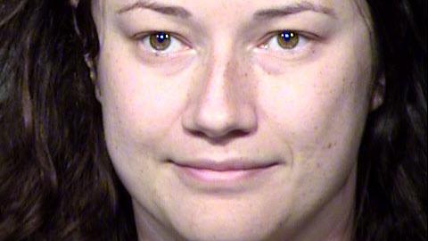 Woman accused of stalking Arizona man at home, work